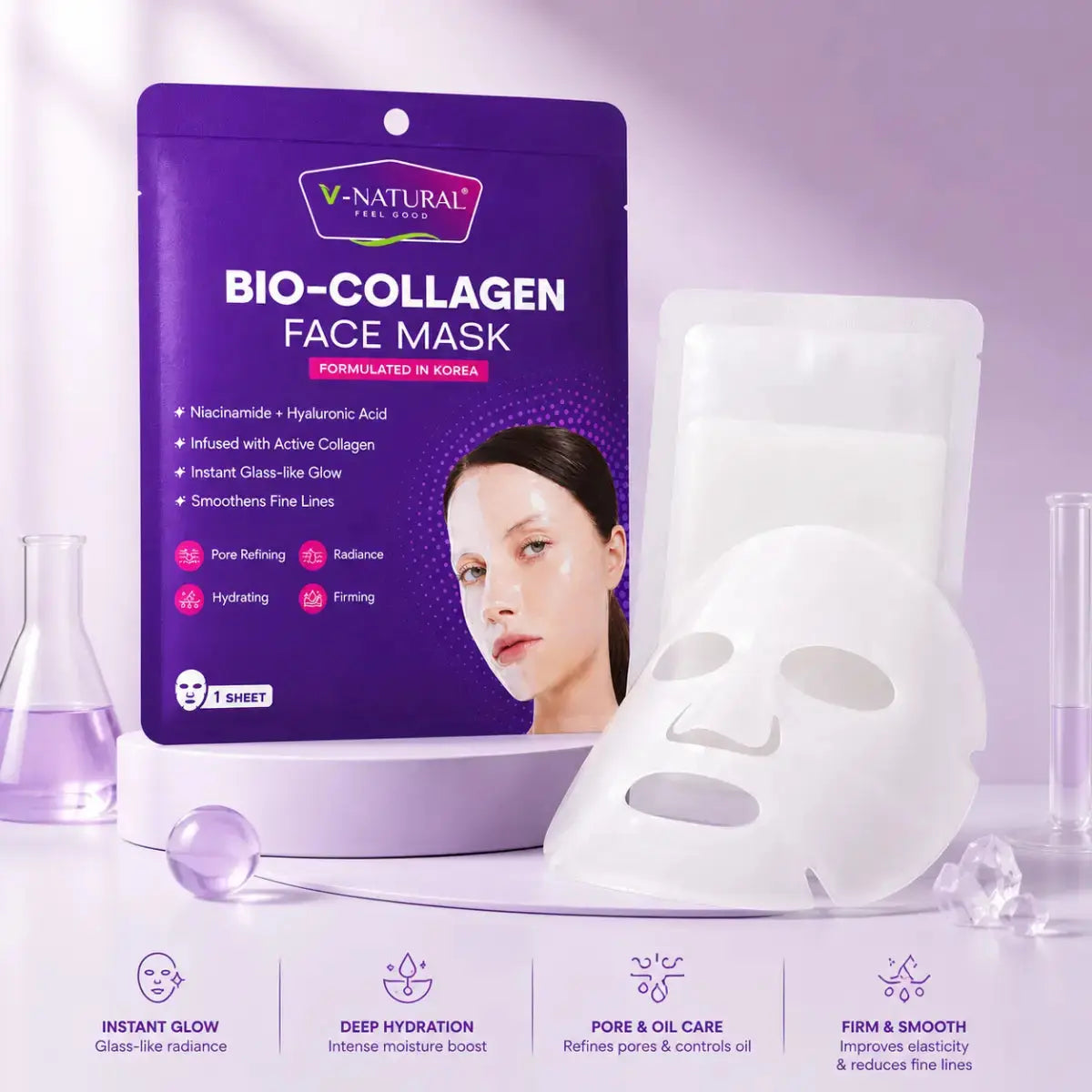 V-Natural Bio-Collagen Face Mask packaging in purple, shown with a white sheet mask and a sachet on a light lavender background with cosmetic props and feature icons at the bottom.