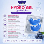 V-Natural Hydro Gel Eye Patches benefits infographic on a light blue background, featuring a clear blister pack with a blue eye patch, blueberries, water droplets, and text detailing benefits like brightening dark circles and reducing puffiness.
