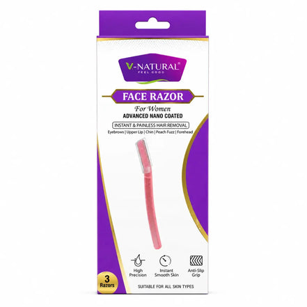 V-Natural Face Razor for women in its retail packaging, featuring a pink single-blade razor shown through a clear window on a white and purple box.