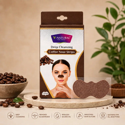 V-Natural Deep Cleansing Coffee Nose Strips packaging box shown on a beige studio background with coffee beans, a bowl, and a plant. The box is brown and white with a photo of a woman wearing a brown nose strip, and a loose brown nose strip is displayed in front.