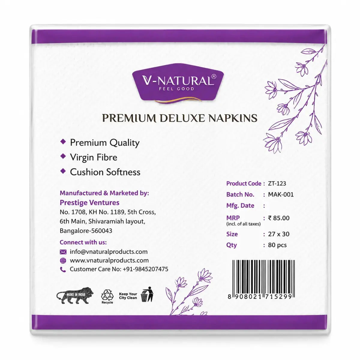 The back of a V-Natural Premium Deluxe Napkins box, showing product details, manufacturing information, and a barcode on a white background with purple accents.