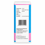 The back of a white roll of natural tissues with a blue and pink label, showing product details, a barcode, and manufacturer contact information on a white background.