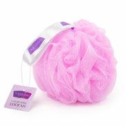 A pink mesh bath loofah with a white and purple ribbon handle and a hanging tag, photographed on a clean white background.