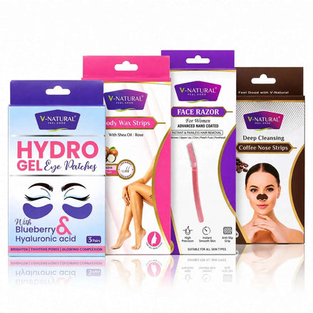 Four V-Natural Self Care skincare packaging products arranged in a row on a white reflective background: Hydro Gel Eye Patches, Body Wax Strips, Face Razor, and Deep Cleansing Coffee Nose Strips.