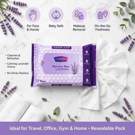 V-Natural Refreshing Wipes Lavender pack shown on a white marble background with decorative lavender sprigs, eucalyptus leaves, and folded white towels. Above the product are four lavender circles with icons and text for Face & Hands, Baby Safe, Makeup Re