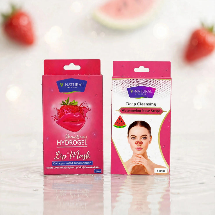 Two pink V-Natural skincare product boxes on a glossy white surface with blurred strawberries in the background. The left box is Strawberry Hydrogel Lip Mask, and the right box is Watermelon Deep Cleansing Nose Strips.