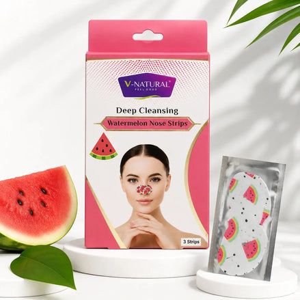 V-Natural Deep Cleansing Watermelon Nose Strips packaging box displayed on a white pedestal, alongside an individual packet of the nose strips and watermelon slice props on a clean white background with soft leaf shadows.